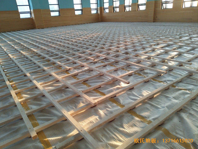 武漢廣阜屯小學(xué)清江錦城分校籃球館運動地板施工案例1